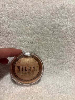 New milani baked highlighter shade 02 champagne Dor’o